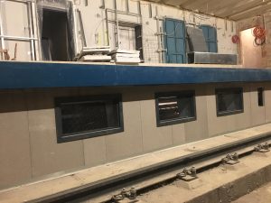 Noise absorbing panels on railway station