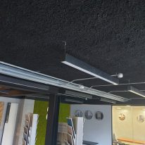 Black Acoustic Spray Plaster in open plan office